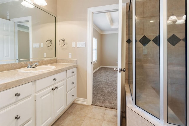 full bathroom featuring tile patterned flooring, ornamental molding, tiled shower, and vanity