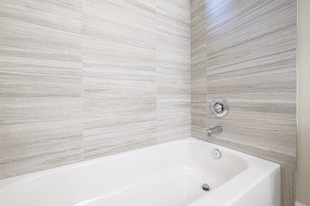 bathroom with a washtub