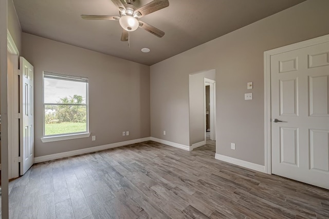 interior space featuring ceiling fan and hardwood / wood-style flooring