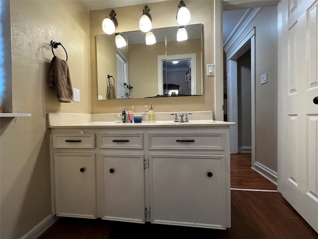 bathroom with wood-type flooring and vanity