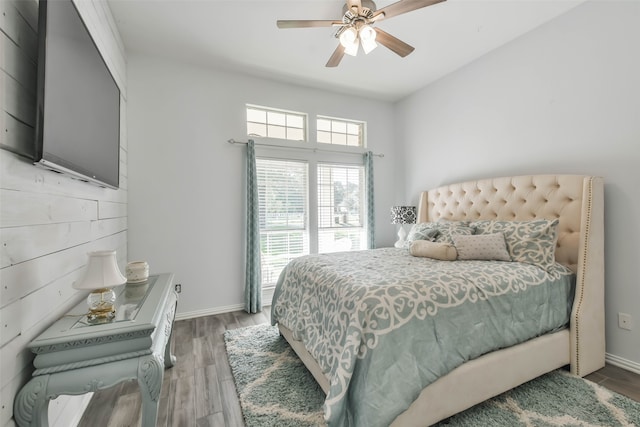 bedroom featuring ceiling fan and hardwood / wood-style floors