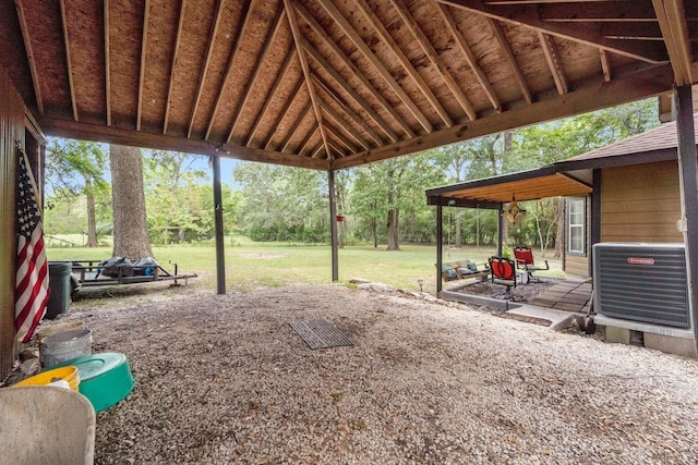 exterior space featuring a patio and cooling unit