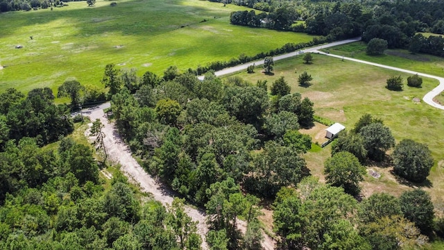 birds eye view of property featuring a rural view