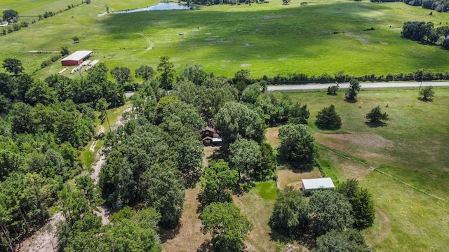 drone / aerial view featuring a water view and a rural view