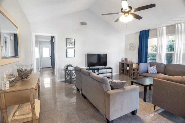 living room featuring ceiling fan, a textured ceiling, and high vaulted ceiling