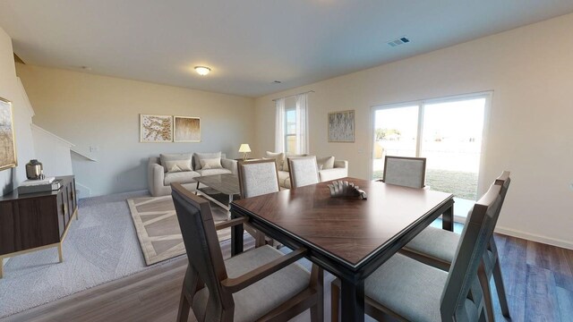 21576 Rolling Streams Dr, New Caney, TX 77357 - dining space with wood-type flooring
