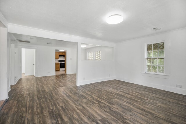 interior space with hardwood / wood-style floors and ornamental molding