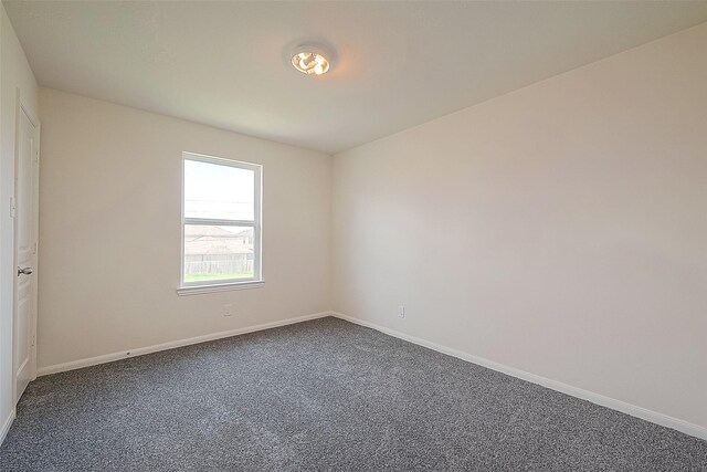 empty room featuring carpet flooring