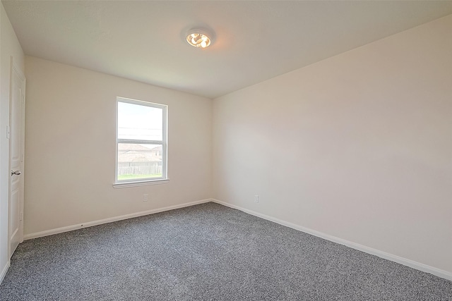 empty room featuring carpet floors