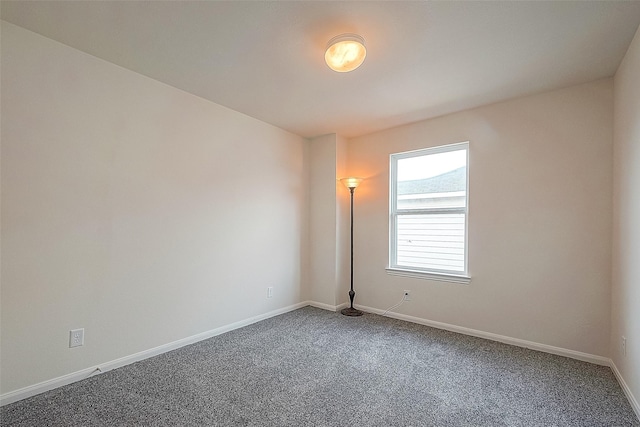 empty room featuring carpet flooring