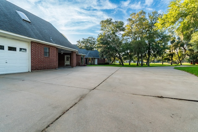 view of patio / terrace featuring a garage