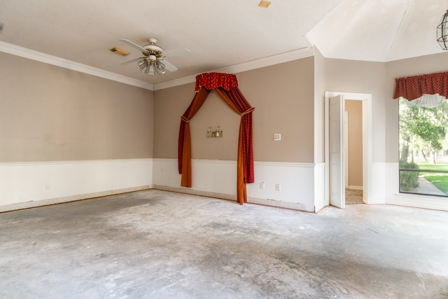 spare room featuring ceiling fan, ornamental molding, and a textured ceiling