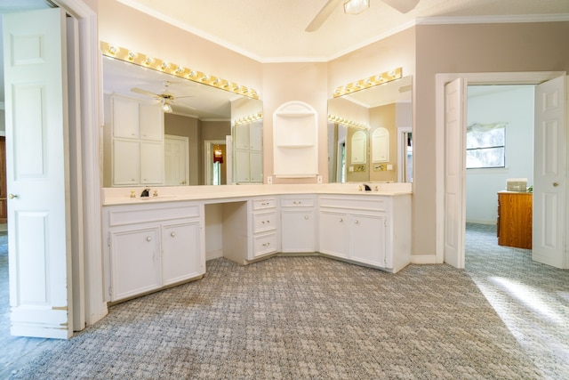 bathroom with ceiling fan, vanity, and ornamental molding