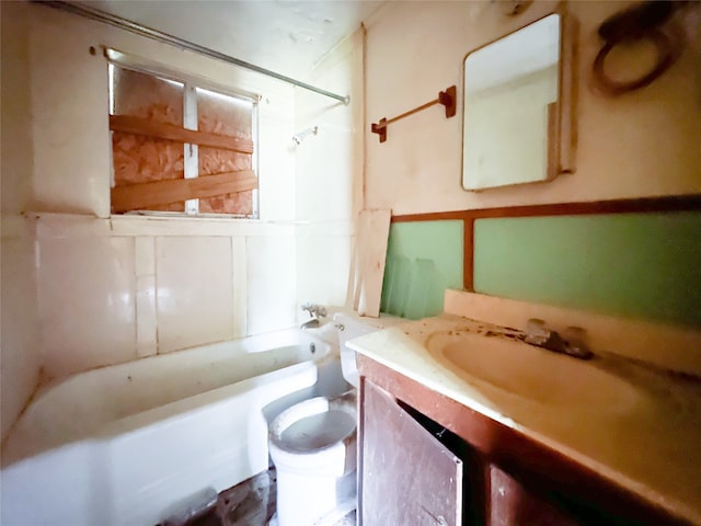 full bathroom with tub / shower combination, toilet, and vanity