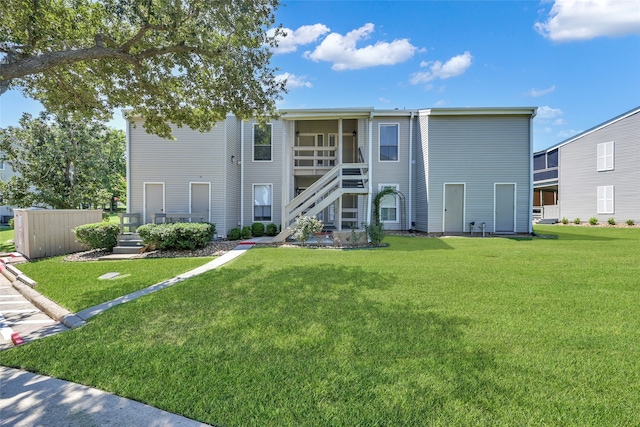 view of front of home with a front yard