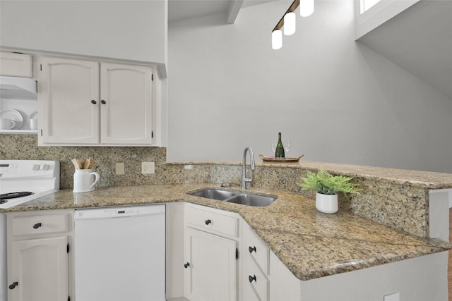 kitchen featuring white appliances, sink, kitchen peninsula, decorative backsplash, and white cabinetry