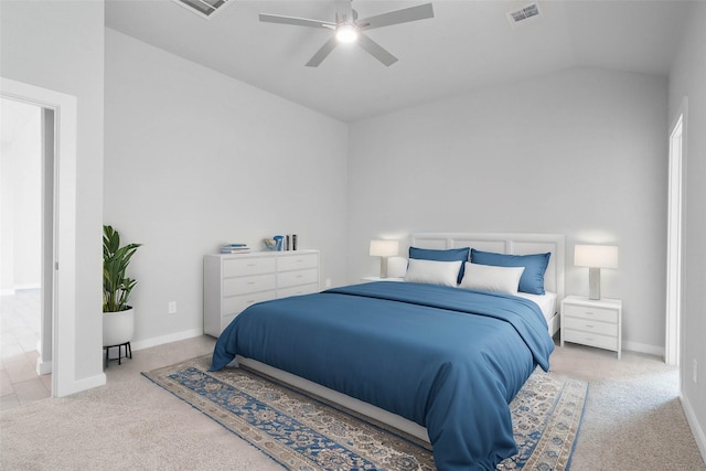 carpeted bedroom featuring vaulted ceiling and ceiling fan