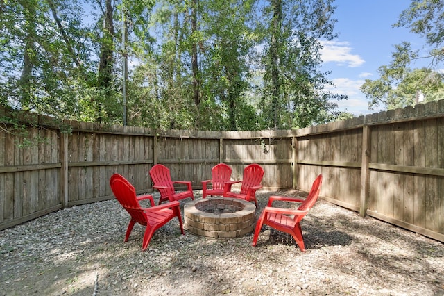 view of patio with an outdoor fire pit