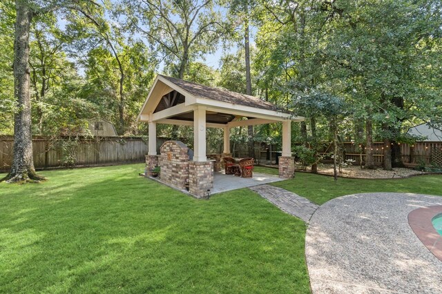 view of yard with a gazebo and a patio