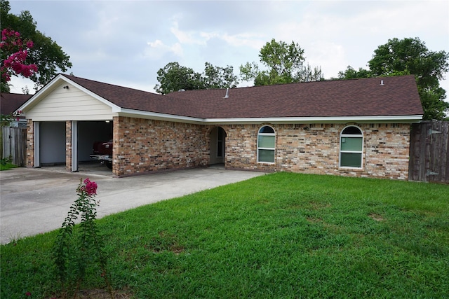 ranch-style home featuring driveway, an attached garage, fence, a front lawn, and brick siding