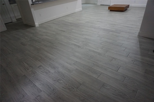 room details featuring wood finished floors and baseboards