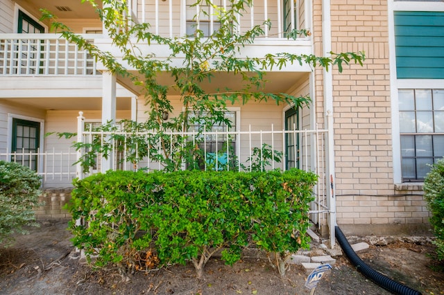 view of property exterior with a balcony