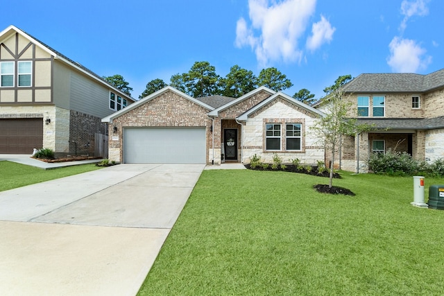 view of front of home featuring a garage and a front yard