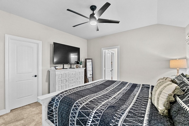 carpeted bedroom featuring ceiling fan and lofted ceiling