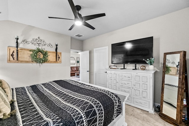 bedroom with ceiling fan and light carpet