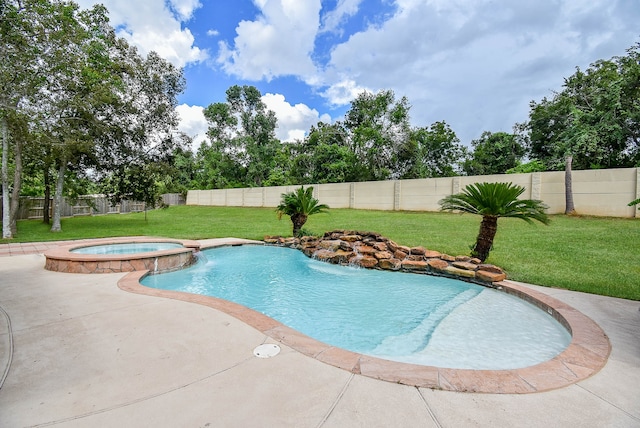 view of swimming pool featuring pool water feature, a patio area, an in ground hot tub, and a lawn