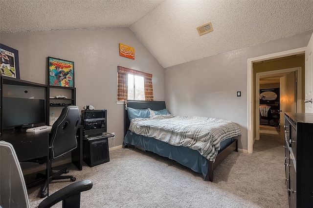 carpeted bedroom featuring a textured ceiling and lofted ceiling