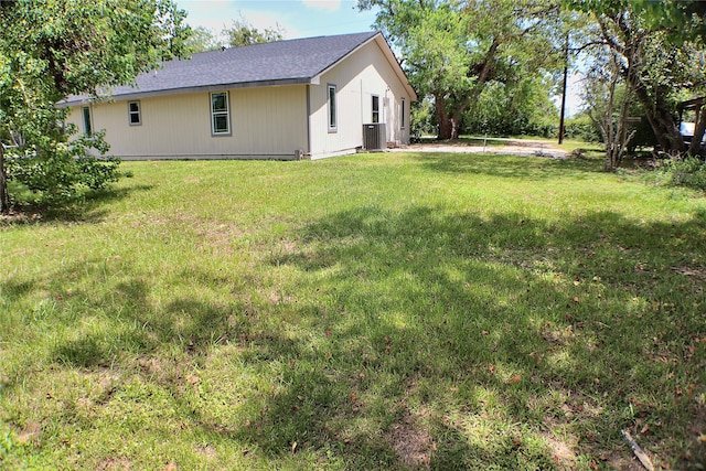 view of yard with central AC unit