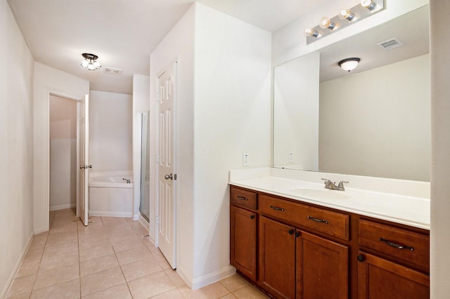 full bath with a garden tub, visible vents, a shower stall, vanity, and tile patterned floors