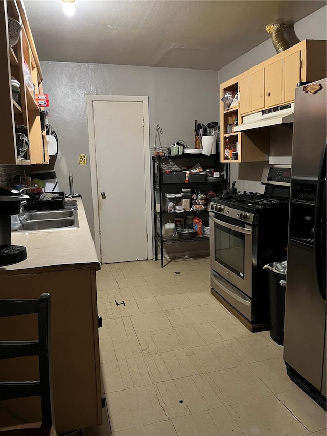 kitchen featuring appliances with stainless steel finishes and sink