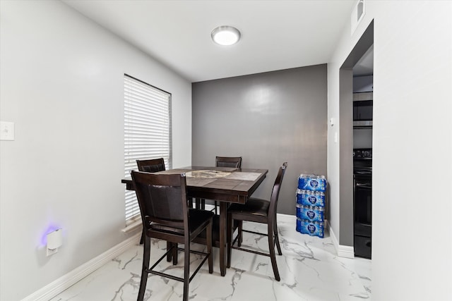 view of tiled dining area