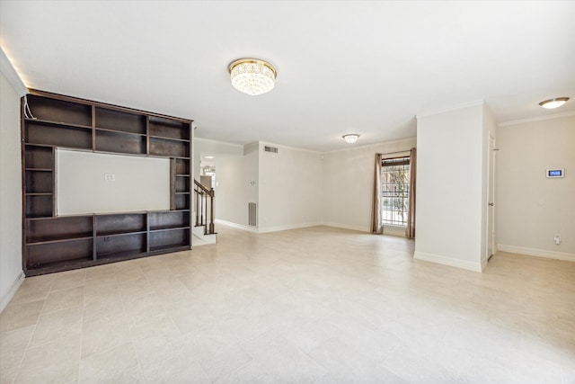 unfurnished living room with ornamental molding