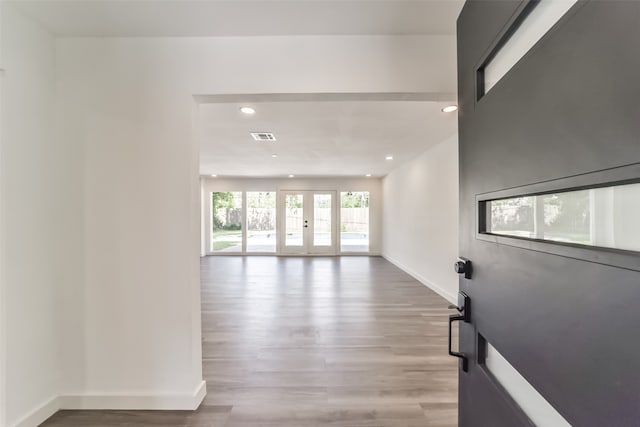 interior space featuring french doors and wood-type flooring