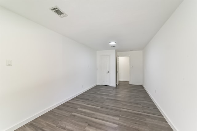 spare room featuring hardwood / wood-style flooring