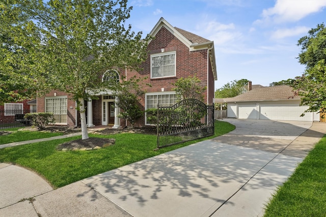 view of front of property with a front lawn and a garage