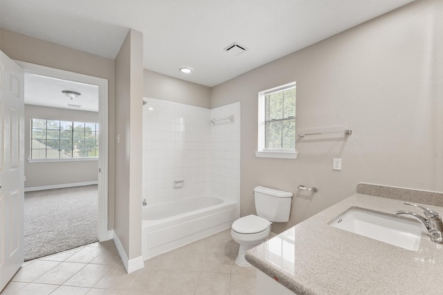 bathroom featuring visible vents, shower / bathing tub combination, toilet, a sink, and tile patterned flooring