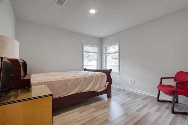 bedroom featuring light hardwood / wood-style floors