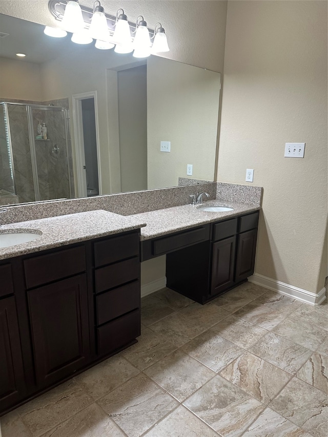 bathroom featuring tile patterned flooring, double vanity, and a shower with door