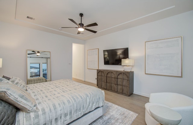 bedroom featuring ceiling fan and light wood-type flooring