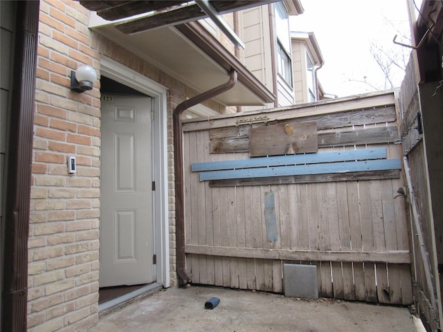 2110 Wilcrest Dr Unit 123, Houston, TX 77042 - entrance to property with brick siding and a surveillance system