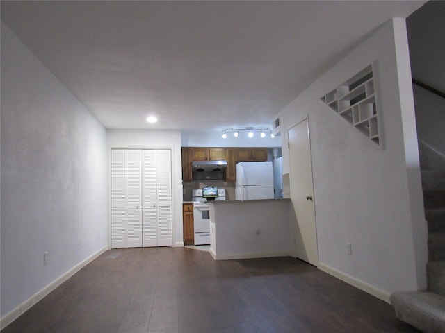 2110 Wilcrest Dr Unit 123, Houston, TX 77042 - unfurnished living room featuring dark wood-style floors and baseboards