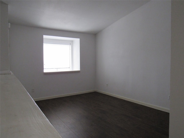 2110 Wilcrest Dr Unit 123, Houston, TX 77042 - spare room with dark wood-style floors and baseboards