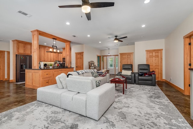 living room featuring ceiling fan