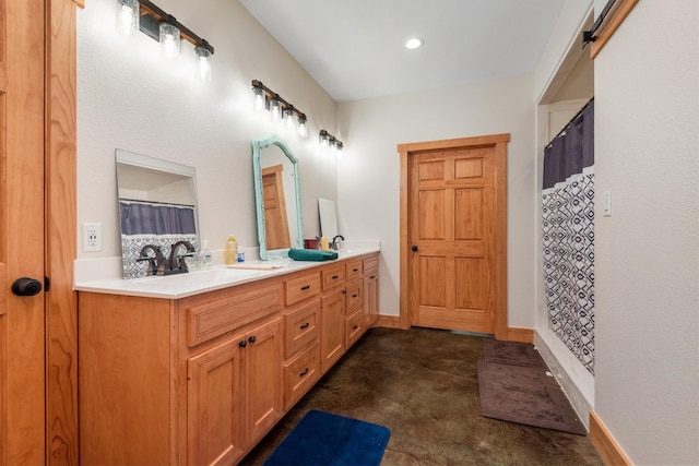 bathroom featuring a shower with curtain, vanity, and concrete flooring