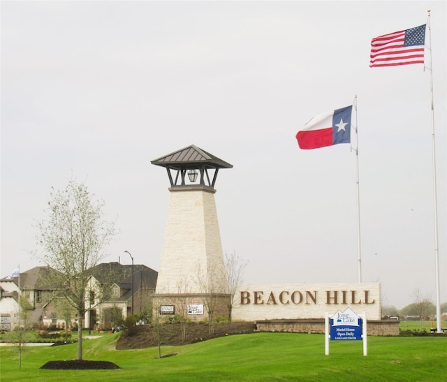 view of community with a lawn