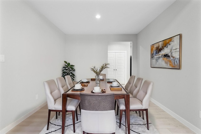 dining space featuring light hardwood / wood-style flooring